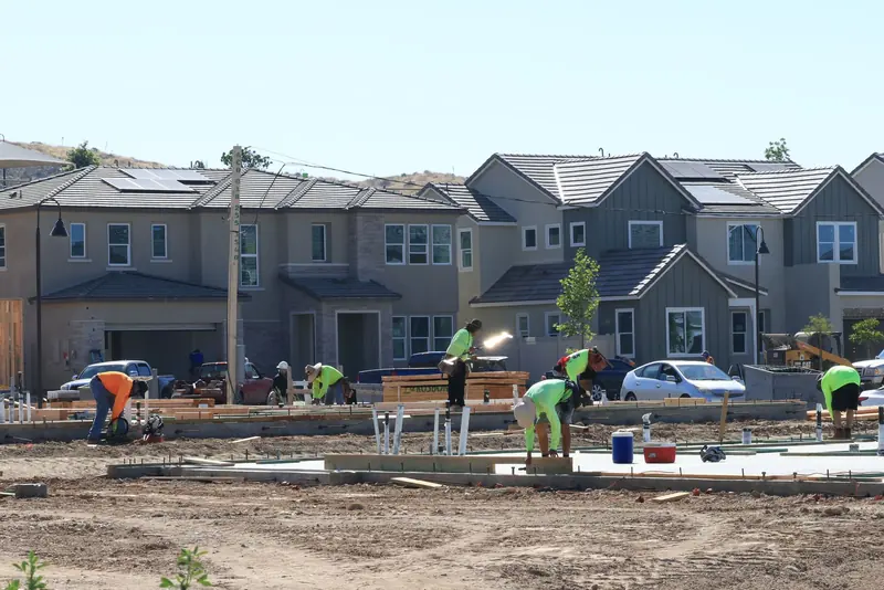 Crew working on a new home subdivision under construction